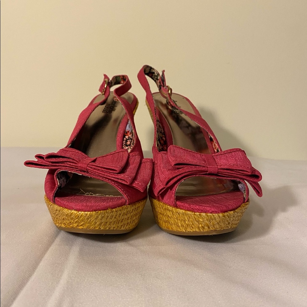 A Charlotte Russe Pink Satin Platform Heel
